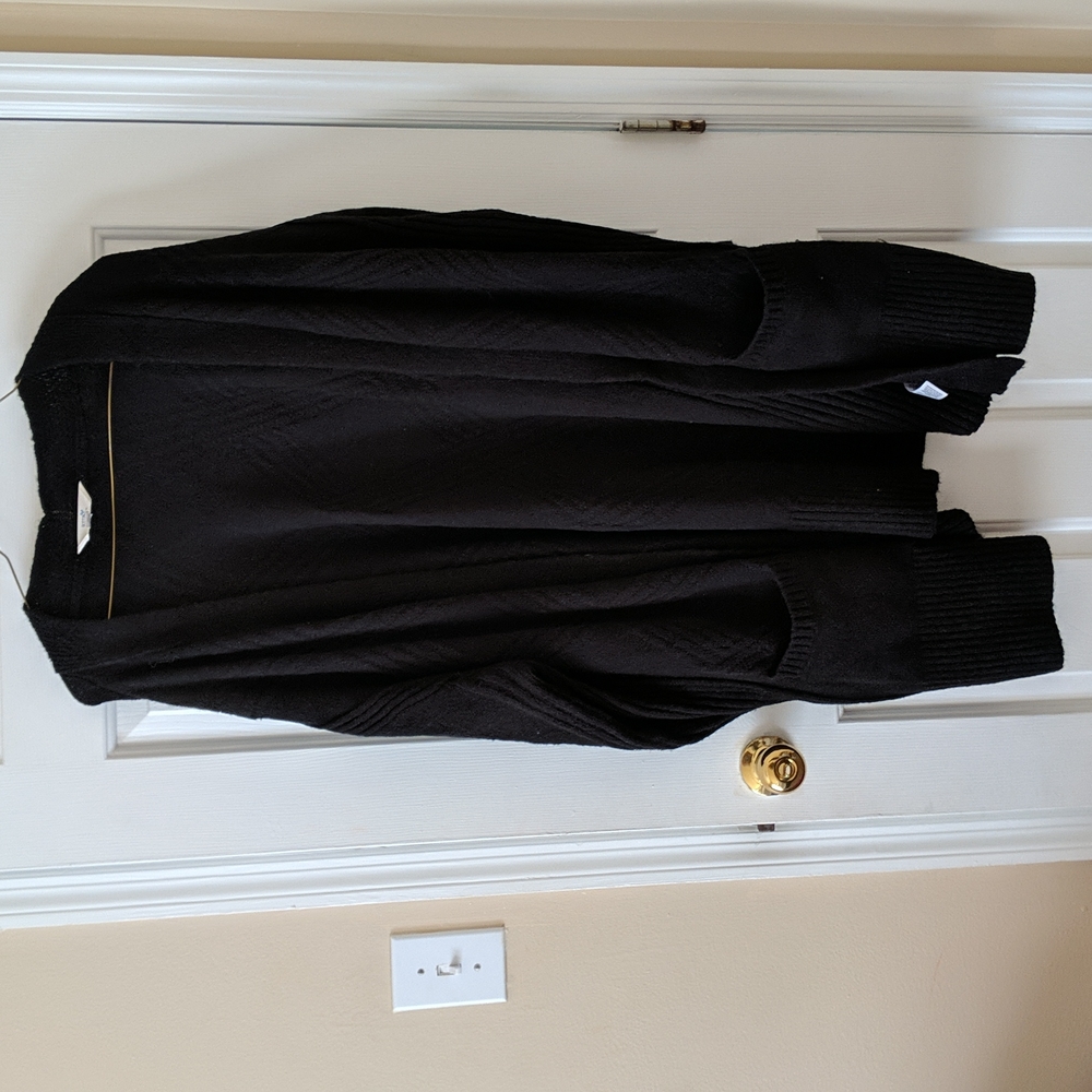 Long cover up sweater. No buttons, front pockets size 3x